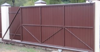 Купить откатные ворота из профнастила Дивногорск, цена от 1797 руб.