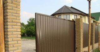 Купить откатные ворота из профнастила Дивногорск, цена от 1797 руб.